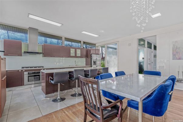 Dining room, Interior, Kitchen, Recessed Lighting, Stainless Steel Appliances, Wood Texture Flooring