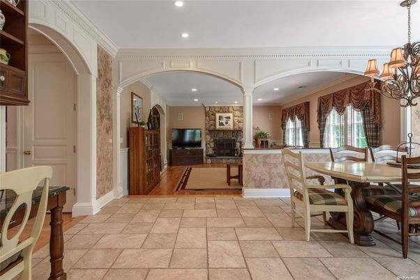 Chandelier, Dining room, Fireplace, Interior, Recessed Lighting, Wood Texture Flooring