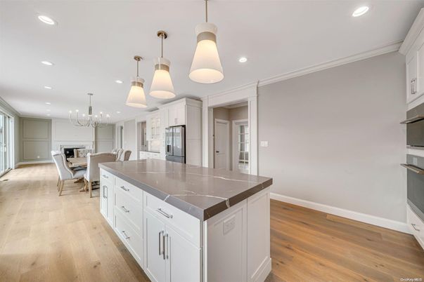 Chandelier, Dining room, Interior, Kitchen, Pendant Lights, Recessed Lighting, Stainless Steel Appliances, Wood Texture Flooring
