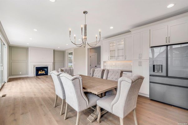 Chandelier, Dining room, Fireplace, Interior, Kitchen, Living room, Pendant Lights, Recessed Lighting, Wood Texture Flooring