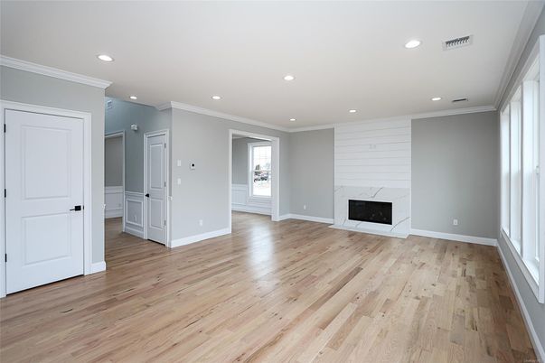 Empty room, Fireplace, Interior, Recessed Lighting, Wood Texture Flooring