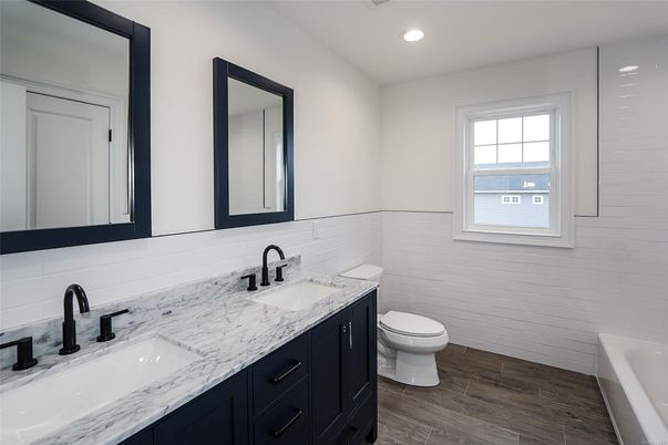 Bathroom, Dual Sink Vanities, Interior, Recessed Lighting, Wood Texture Flooring