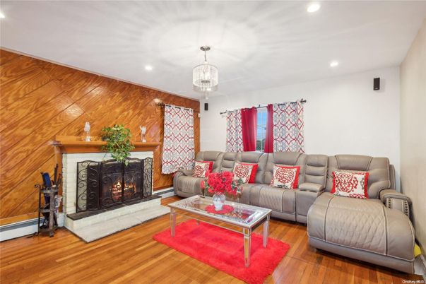 Chandelier, Fireplace, Interior, Living room, Recessed Lighting, Wood Texture Flooring