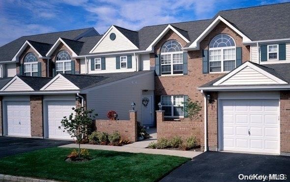 Attached, Exterior, Facade, Brick Facade, Brick Traditional
