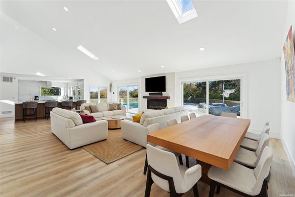 Dining room, Fireplace, Interior, Kitchen, Living room, Recessed Lighting, Wood Texture Flooring