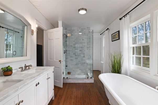 Bathroom, Dual Sink Vanities, Free Standing Baths, Glass Shower, Interior, Wood Texture Flooring