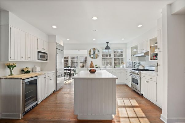 Dining room, Interior, Kitchen, Pendant Lights, Recessed Lighting, Stainless Steel Appliances, Wood Texture Flooring