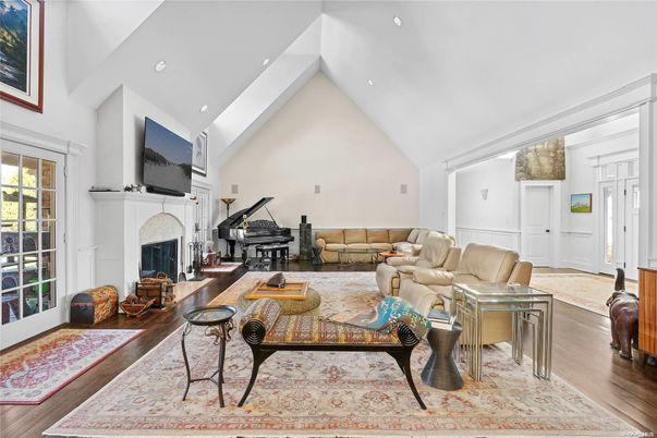 Fireplace, Interior, Living room, Piano, Recessed Lighting, Wood Texture Flooring