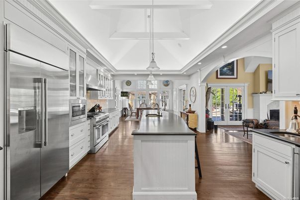 Fireplace, Interior, Kitchen, Pendant Lights, Recessed Lighting, Stainless Steel Appliances, Wood Texture Flooring