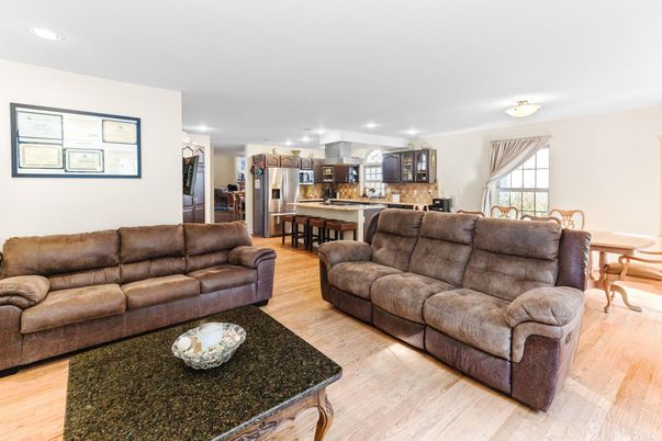 Dining room, Interior, Kitchen, Living room, Recessed Lighting, Stainless Steel Appliances, Wood Texture Flooring