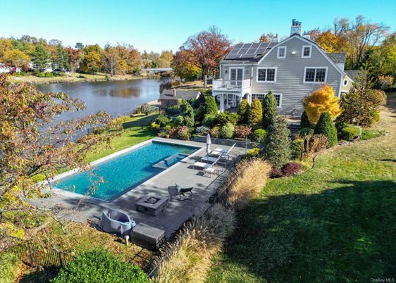 Exterior, Lake, Pool, Solar Panels