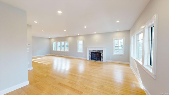 Empty room, Fireplace, Interior, Recessed Lighting, Wood Texture Flooring