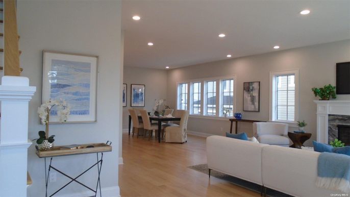 Dining room, Fireplace, Interior, Living room, Recessed Lighting, Wood Texture Flooring