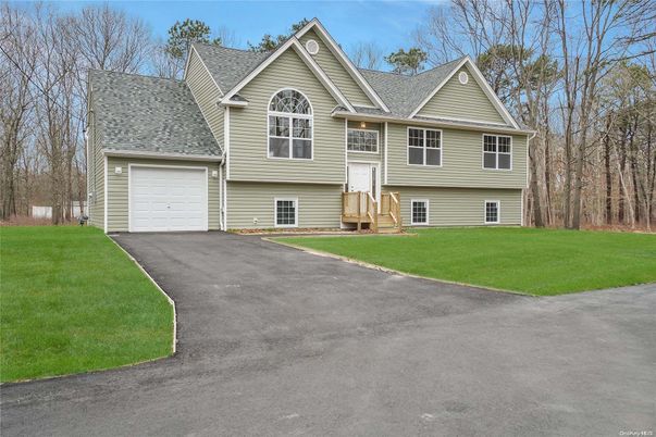 Attached, Exterior, Facade, Raised Ranch