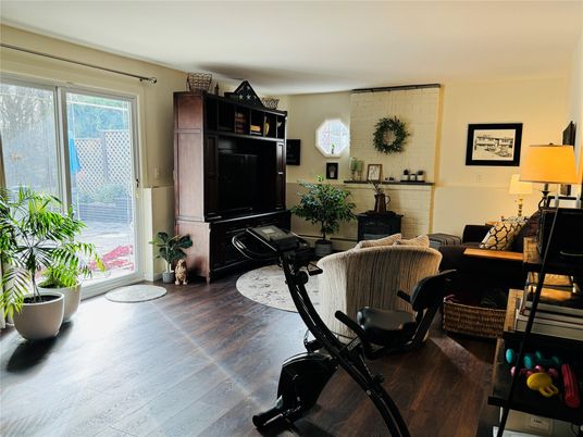 Fireplace, Fitness Equipment, Interior, Stone Walls, Wood Texture Flooring