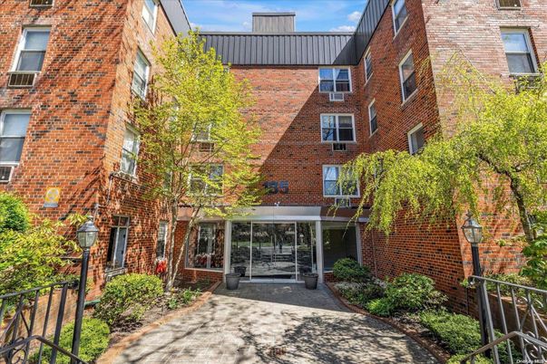 Exterior, Facade, Brick Facade, Condo Building