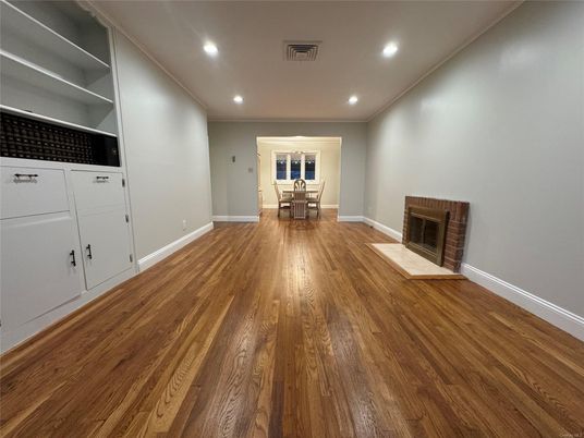 Dining room, Empty room, Fireplace, Interior, Recessed Lighting, Wood Texture Flooring