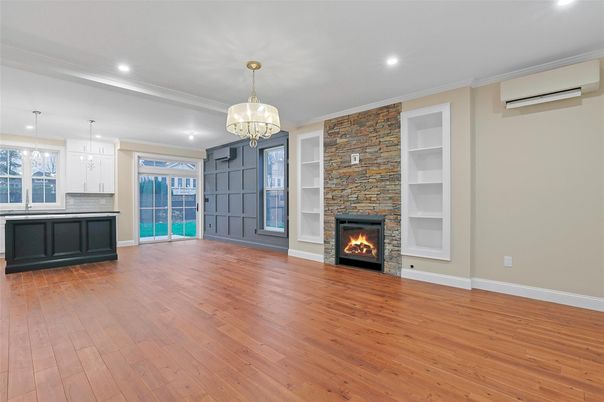 Chandelier, Empty room, Fireplace, Interior, Kitchen, Pendant Lights, Recessed Lighting, Wood Texture Flooring