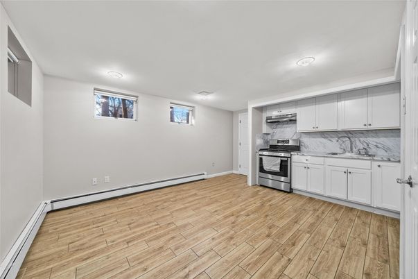 Interior, Kitchen, Marble Walls, Stainless Steel Appliances, Wood Texture Flooring