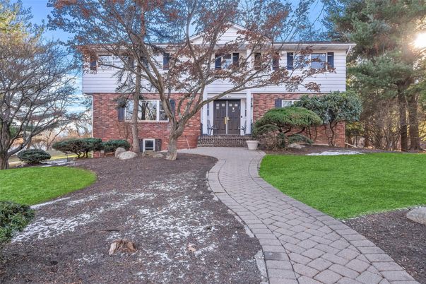 Exterior, Facade, Brick Facade, Raised Ranch