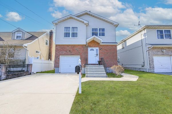 Attached, Exterior, Facade, Brick Facade, Rowhouse