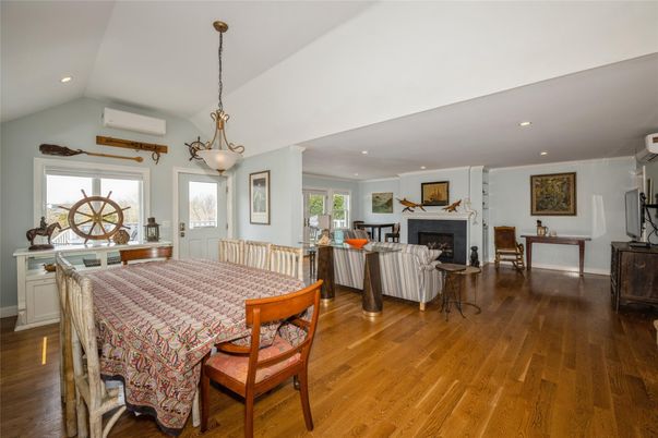 Dining room, Fireplace, Interior, Living room, Pendant Lights, Recessed Lighting, Wood Texture Flooring
