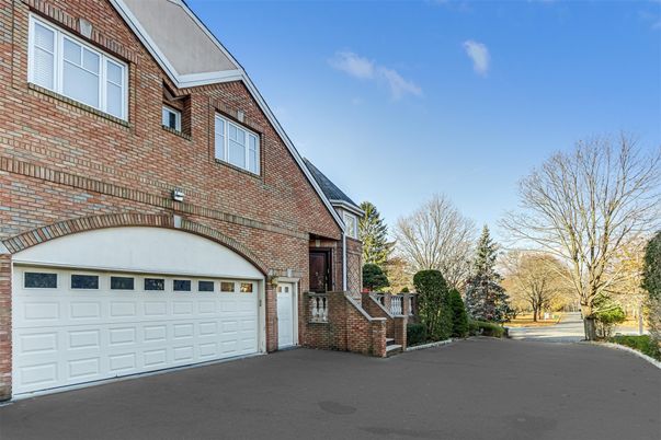 Attached, Exterior, Facade, Brick Facade, Tudor Revival