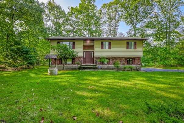 Backyard, Exterior, Facade, Brick Facade, Raised Ranch
