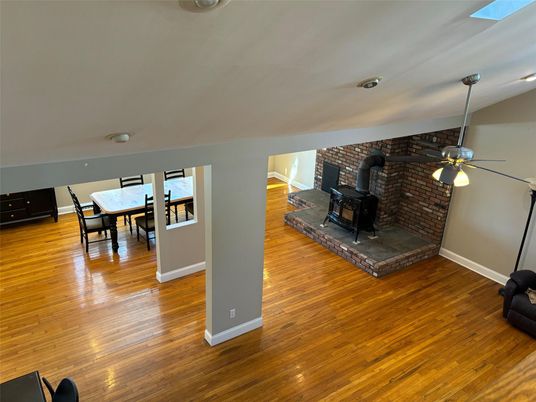 Dining room, Fireplace, Interior, Stone Walls, Wood Texture Flooring