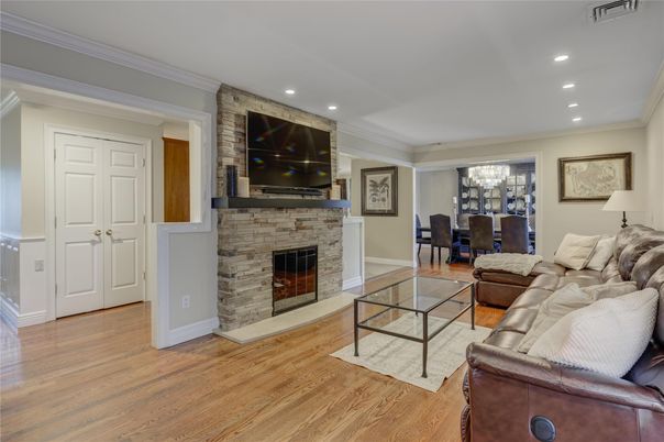 Dining room, Fireplace, Interior, Living room, Recessed Lighting, Wood Texture Flooring