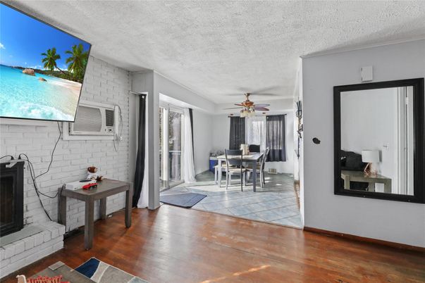 Dining room, Fireplace, Interior, Stone Walls, Wood Texture Flooring