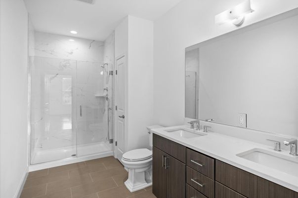 Bathroom, Dual Sink Vanities, Glass Shower, Interior, Marble Walls, Recessed Lighting