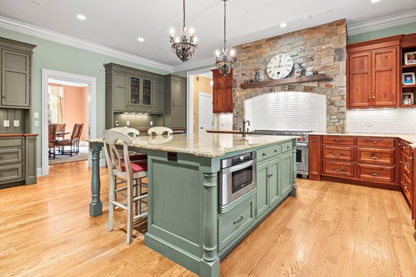 Chandelier, Interior, Kitchen, Pendant Lights, Recessed Lighting, Stainless Steel Appliances, Stone Walls, Wood Texture Flooring