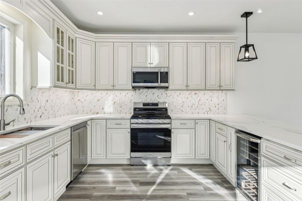 Interior, Kitchen, Pendant Lights, Recessed Lighting, Stainless Steel Appliances, Wood Texture Flooring