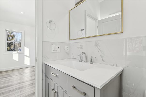 Bathroom, Interior, Marble Walls, Recessed Lighting, Wood Texture Flooring
