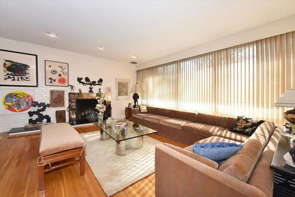 Fireplace, Interior, Living room, Recessed Lighting, Stone Walls, Wood Texture Flooring