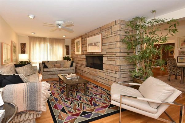 Fireplace, Interior, Living room, Recessed Lighting, Stone Walls, Wood Texture Flooring