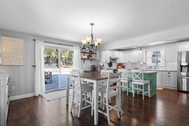 Chandelier, Dining room, Interior, Kitchen, Stainless Steel Appliances, Wood Texture Flooring