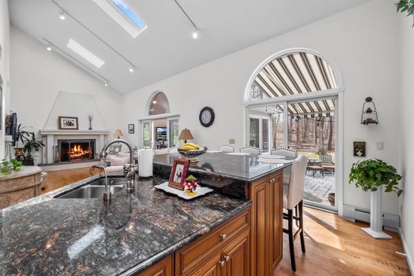 Dining room, Fireplace, Interior, Kitchen, Recessed Lighting, Wood Texture Flooring