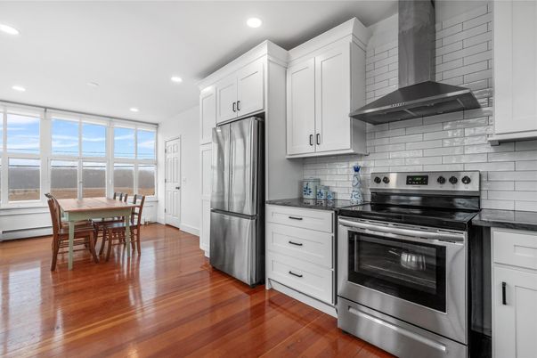 Dining room, Interior, Kitchen, Recessed Lighting, Stainless Steel Appliances, Wood Texture Flooring