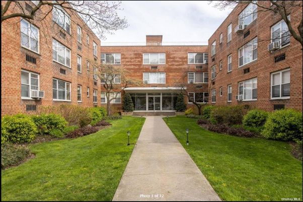 Exterior, Facade, Brick Facade, Condo Building