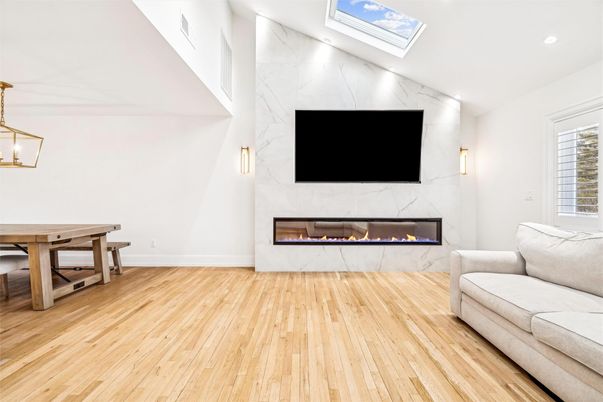 Dining room, Fireplace, Interior, Marble Walls, Pendant Lights, Recessed Lighting, Wood Texture Flooring