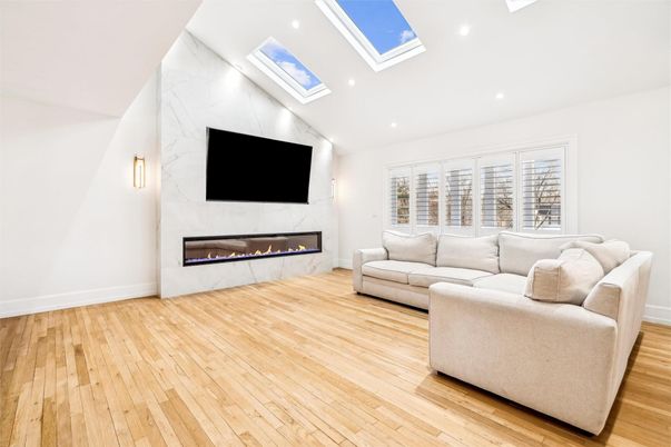 Fireplace, Interior, Living room, Marble Walls, Recessed Lighting, Wood Texture Flooring