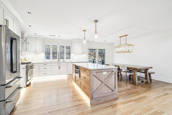 Dining room, Interior, Kitchen, Pendant Lights, Recessed Lighting, Stainless Steel Appliances, Wood Texture Flooring