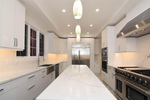 Interior, Kitchen, Marble Walls, Pendant Lights, Recessed Lighting, Stainless Steel Appliances