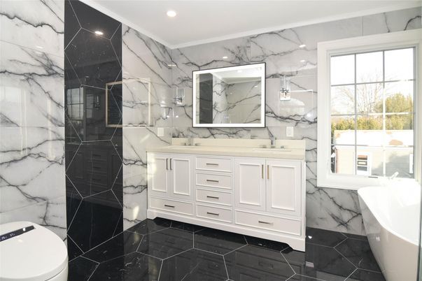 Bathroom, Dual Sink Vanities, Interior, Marble, Marble Walls, Recessed Lighting