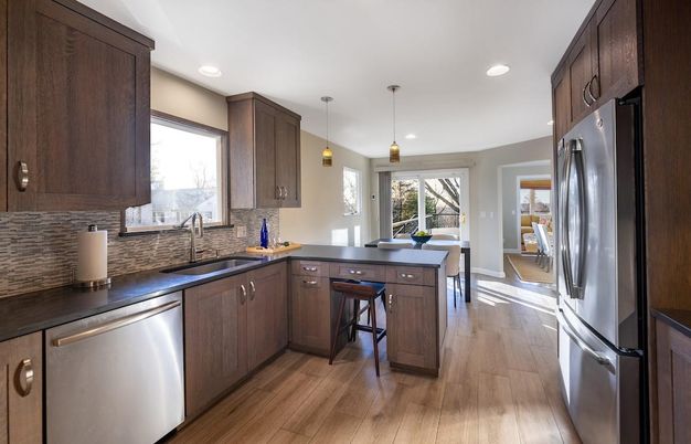 Dining room, Interior, Kitchen, Pendant Lights, Recessed Lighting, Stainless Steel Appliances, Wood Texture Flooring