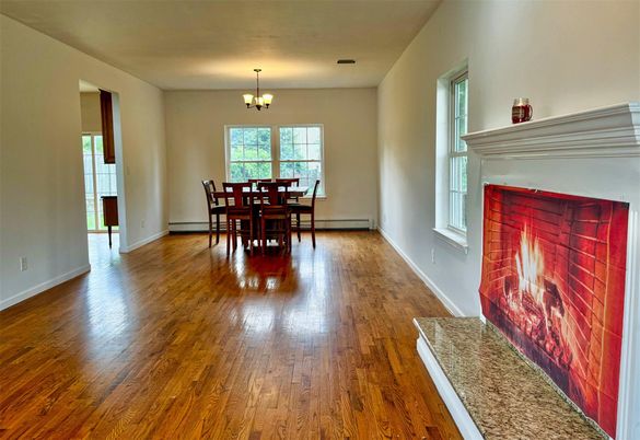 Chandelier, Dining room, Fireplace, Interior, Wood Texture Flooring