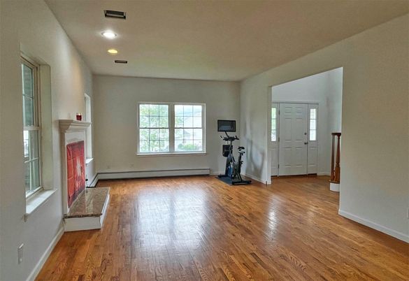 Fireplace, Fitness Equipment, Interior, Recessed Lighting, Wood Texture Flooring