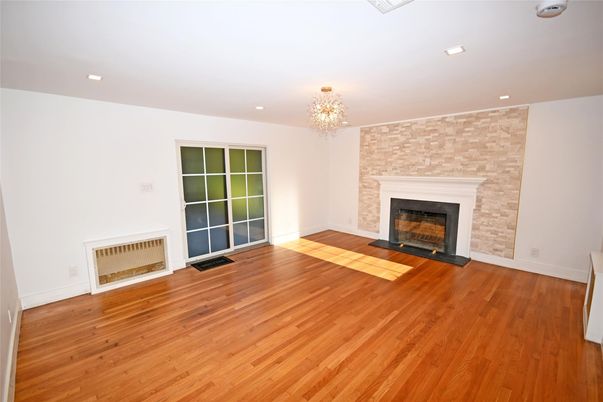 Chandelier, Empty room, Fireplace, Interior, Recessed Lighting, Wood Texture Flooring